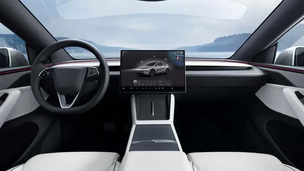 Botones de control en el maletero para el plegado de asientos en el SUV familiar de Tesla Model Y L.